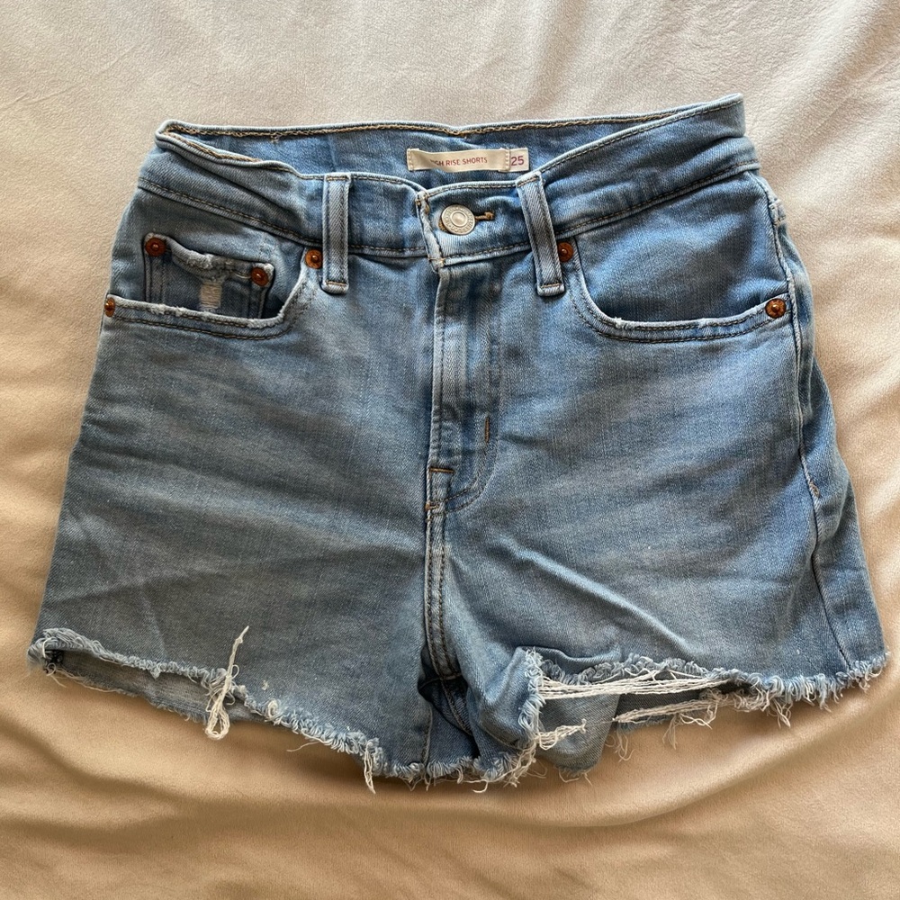 Levi's Blue Jean Shorts with Frayed Hems and Distressed Look